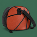 Compact sports ball shoulder bag on Court District green
