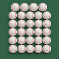 Soft foam baseball 24 pack on green background