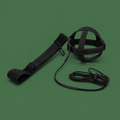 Black adjustable soccer kick trainer belt on green background