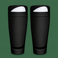 Black soccer shin guard socks on green background