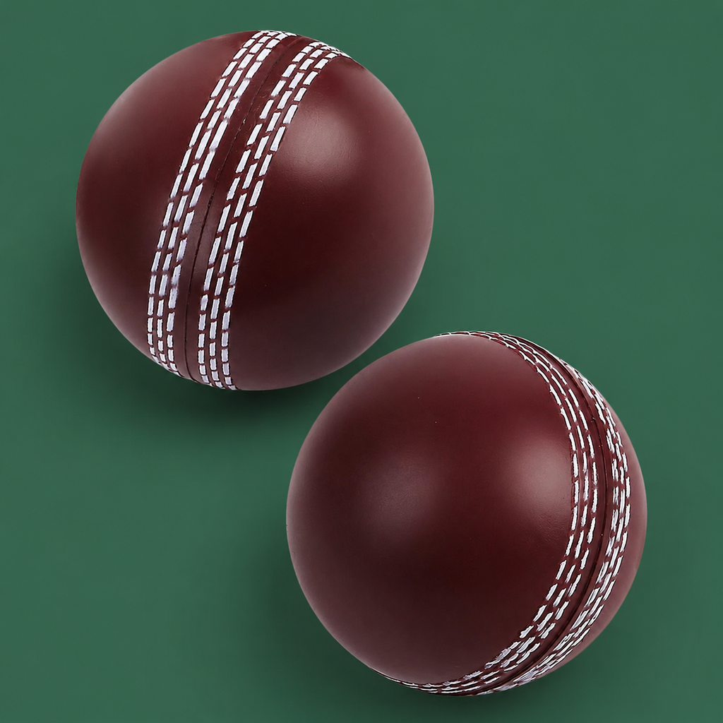 Soft indoor cricket training balls on Court District green background