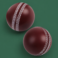 Soft indoor cricket training balls on Court District green background